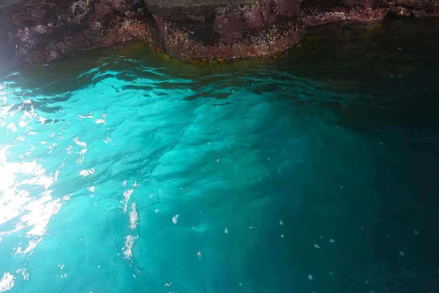 From Praia: Boat Trip, Snorkeling, Cave & BBQ on the Beach - Guides and group vibe: why the day can feel great or just okay