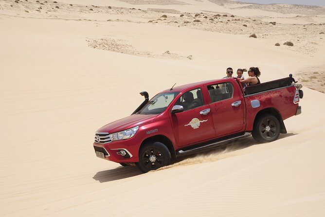 Half Day 4x4 Trip - Dunes, Caves, Santa Monica Beach & Village - Guides, local stories, and why the day feels personal